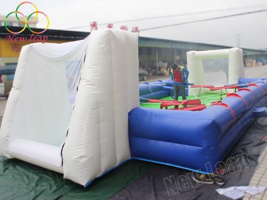 Inflatable human foosball table